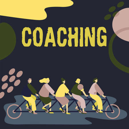 Conceptual caption Coaching. Word Written on person supports client in achieving specific personal goal Colleagues Riding Bicycle Representing Teamwork Successful Problem Solving.の写真素材
