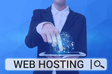 Hand writing sign Web Hosting. Concept meaning The activity of providing storage space and access for websites Lady Pressing Screen Of Mobile Phone Showing The Futuristic Technologyの写真素材
