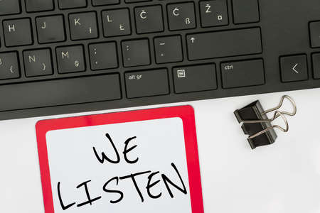 Text caption presenting We Listen. Internet Concept Group of showing that is willing to hear...