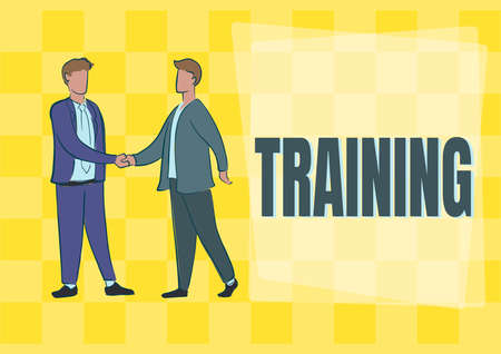 Handwriting text Training. Business concept An activity occurred when starting a new job project or work Two colleagues shaking hands congratulating successful teamwork.の写真素材