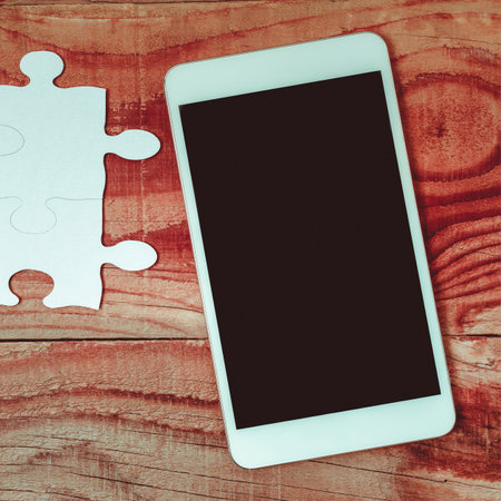 Important Messages Presented On Phone On Desk With Pencils, Books, Calculator And Clipboard Around. Crutial Inforations Shown On Cellphone On Table With Notebooks And Pens.の写真素材