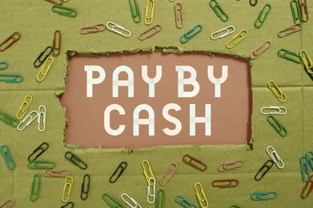 Inspiration showing sign Pay By Cash. Business idea Customer paying with money coins bills Retail...