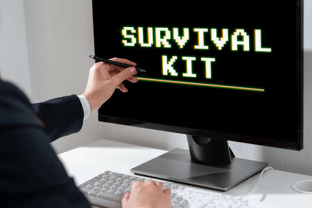 Text sign showing Survival Kit. Word for Emergency Equipment Collection of items to help someone...