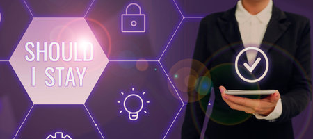 Text caption presenting Should I Stay. Business idea Looking for reasons to remain on a place Doubtful Indecision Lady in suit holding pen symbolizing successful teamwork accomplishments.の写真素材