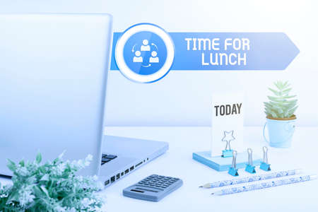 Writing displaying text Time For Lunch. Internet Concept Moment to have a meal Break from work Relax eat drink rest Phone Screen With Important Message On Desk With Keyboard, Pen And Coffee.の写真素材