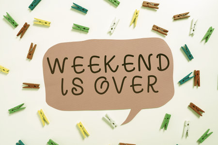 Conceptual caption Weekend Is Over. Word Written on Time for relax has ended back to routine everyday activities Lady in suit holding pen symbolizing successful teamwork accomplishments.の写真素材