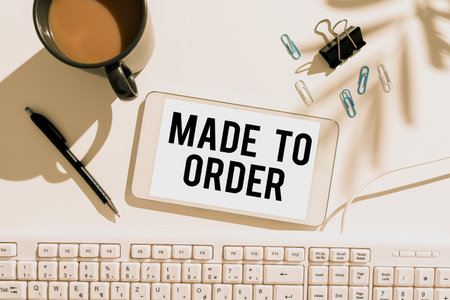 Hand writing sign Made To Order. Concept meaning Something done specially for someone Tailored authentic Mobile Phone Screen With Important Message On Desk With Coffee And Keyboardの写真素材