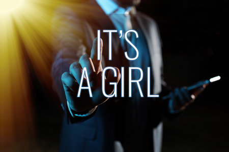 Hand writing sign It S Is A Girl. Business showcase Expecting a baby cute pastel colors a lot of pink Man With Pen Pointing On Digital Target Presenting Strategies.の写真素材