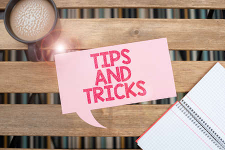 Hand writing sign Tips And Tricks. Business approach Steps Life hacks Handy advice Recommendations...