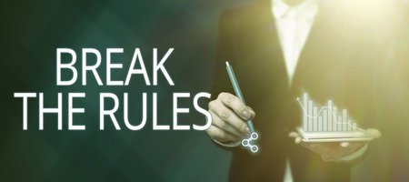 Text showing inspiration Break The RulesTo do something against formal rules and restrictions. Concept meaning To do something against formal rules and restrictionsの写真素材