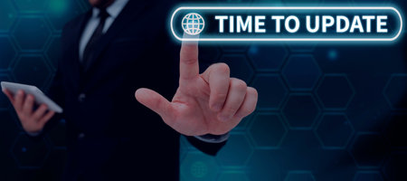 Text sign showing Time To UpdateThe latest information about a particular situation. Conceptual...