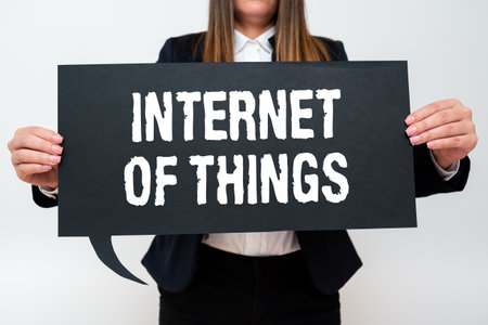 Hand writing sign Internet Of Things connection of Devices to the Net to Send Receive Data. Business concept connection of Devices to the Net to Send Receive Dataの写真素材