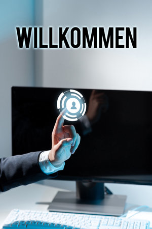 Writing displaying text Willkommen. Business overview welcoming showing event or your home something to that effectの写真素材