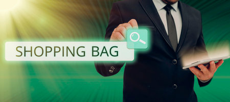 Sign displaying Shopping Bag. Business idea Containers for carrying personal possessions or purchasesの写真素材