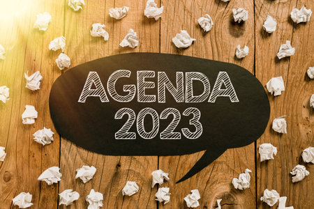Conceptual caption Agenda 2023. Business overview list of activities in order which they are to be taken upの写真素材