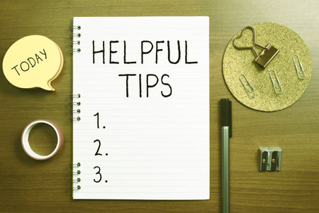 Text sign showing Helpful Tips. Business idea Ask an Expert Solutions Hints Consulting Warningの写真素材