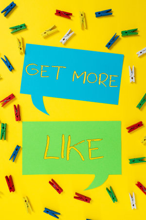 Sign displaying Get More Like. Concept meaning Thumbs up Hashtags Page Plugin Approvals Followersの写真素材