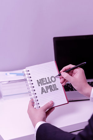 Text caption presenting Hello April. Internet Concept a greeting expression used when welcoming the month of Aprilの写真素材