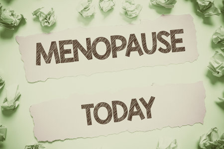 Conceptual caption Menopause. Word for Period of permanent cessation or end of menstruation cycleの写真素材
