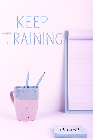 Hand writing sign Keep Training. Conceptual photo Grounding Drilling Always Wonder Be Curious Learnの写真素材