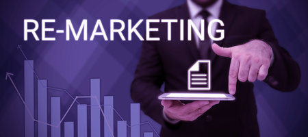 Hand writing sign Re Marketing. Word Written on Strategy to reach potential customers in your websiteの写真素材