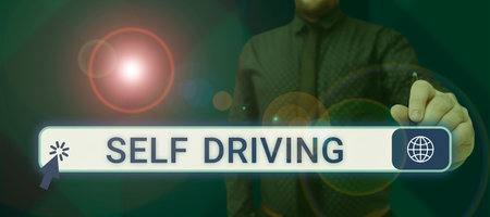 Writing displaying text Self Driving. Business approach Autonomous vehicle Ability to navigate without human inputの写真素材