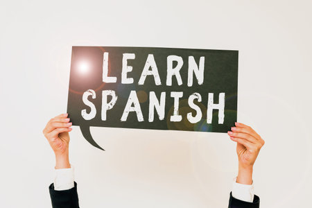 Inspiration showing sign Learn Spanish. Business idea to train writing and speaking the national language of Spainの写真素材
