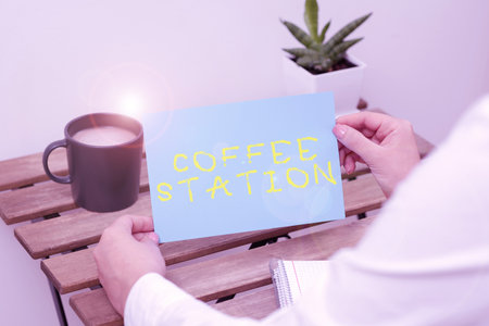 Hand writing sign Coffee Station. Business showcase a small, informal restaurant that typically...