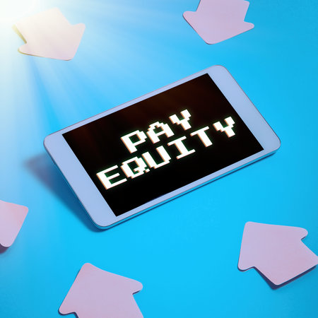 Conceptual display Pay Equity. Conceptual photo eliminating sex and race discrimination in wage systemsの写真素材
