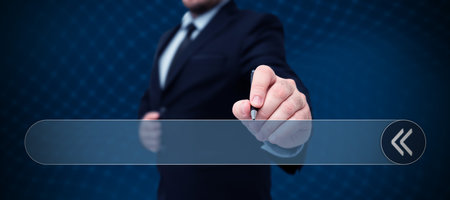 Man Standing Holding Tablet And Pressing On Search Bar. Business Man Carrying Pad Tapping Switch Showing New Futuristic Technologies.の写真素材