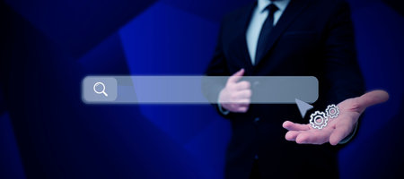 Man Standing Holding Tablet And Pressing On Search Bar. Business Man Carrying Pad Tapping Switch Showing New Futuristic Technologies.の写真素材