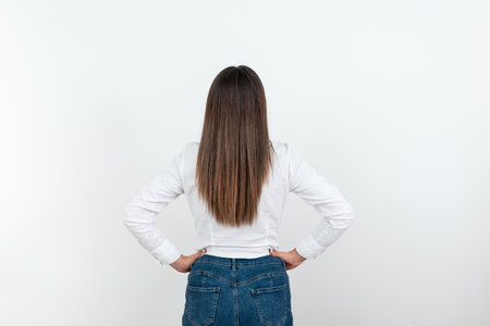 Woman Standing Backwards Coming Up With New Amazing Ideas. Businesswoman Thinking Deeply For Old Wonderful Plans. Guy Brain Storming Brilliant Strategies.の写真素材
