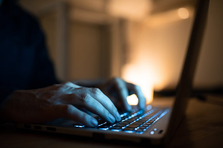 Businessman Typing Recent Updates On Lap Top Keyboard On Desk. Man In Office Writing Important Message On Computer. Executive Inserting Crutial Data Into Pc.の写真素材