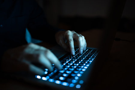 Businessman Typing Recent Updates On Lap Top Keyboard On Desk. Man In Office Writing Important...