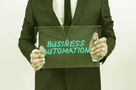 Conceptual caption Business Automation. Business approach Advanced Capabilities Timely Expectations Goals Businessman Holding Transparent Glass And Promoting The Company Brand.の写真素材