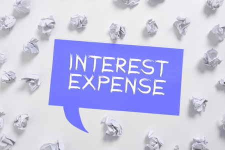 Handwriting text Interest Expense. Business concept connects computers together globally using internetの写真素材