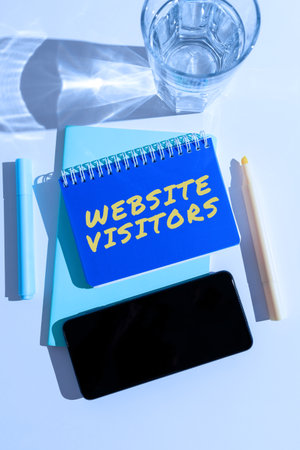Inspiration showing sign Website Visitors. Business approach reason why regularly records their thoughts or experiences Mobile Phone Screen With Important Message On Desk With Coffee And Keyboardの写真素材