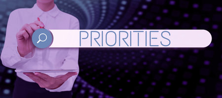 Writing displaying text Priorities. Word for an act or method of supporting and giving advice to a youngerの写真素材