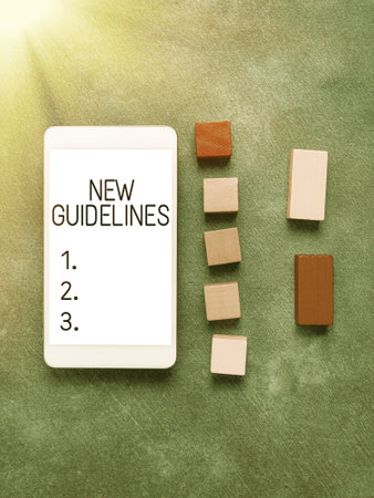 Text sign showing New Guidelines. Business showcase a new list of goals to achieved or to meetの写真素材