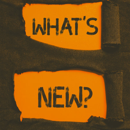 Text sign showing Whats New. Word for Asking about latest Updates Trends Happening Newsの写真素材