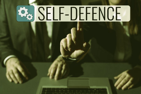 Hand writing sign Self Defense. Conceptual photo the act of defending ones person when physically attackedの写真素材