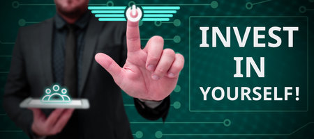 Text sign showing Invest In Yourself. Business approach learn new things or materials thus making your lot betterの写真素材