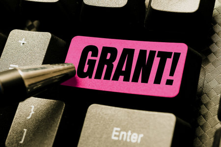 Hand writing sign Grant. Business concept Money given by an organization or government for a purpose...