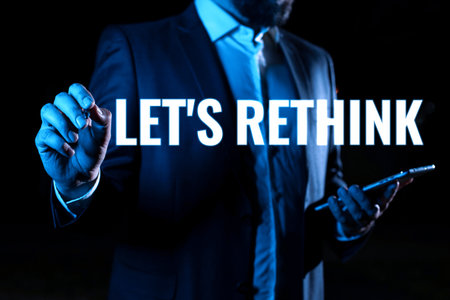 Text caption presenting Lets Rethink. Word Written on an Afterthought To Remember Reconsider Reevaluateの写真素材