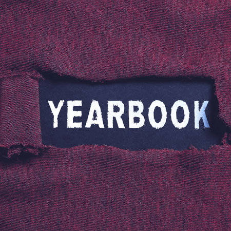 Conceptual display Yearbook. Business concept publication compiled by graduating class as a record of the years activitiesの写真素材
