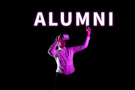 Hand writing sign Alumni. Business showcase former pupil or student especially male one of particular schoolの写真素材