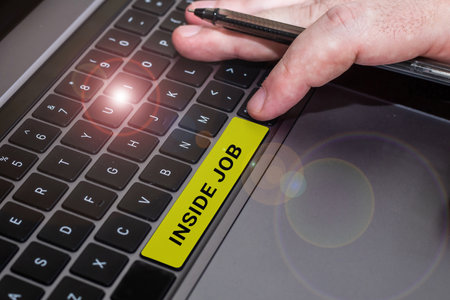Text caption presenting Inside Job. Internet Concept done with the help of someone in a position...