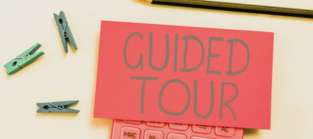 Hand writing sign Guided Tour. Conceptual photo advice or information aimed at resolving problem or...