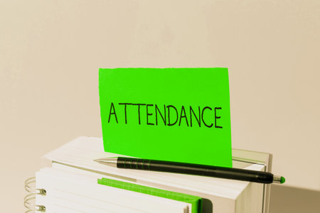 Hand writing sign Attendance. Business idea Going regularly Being present at place or event Number of peopleの写真素材