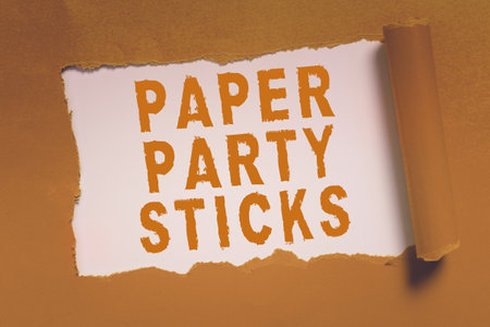 Hand writing sign Paper Party Sticks. Word for hard painted paper shaped used for signs and emojiの写真素材